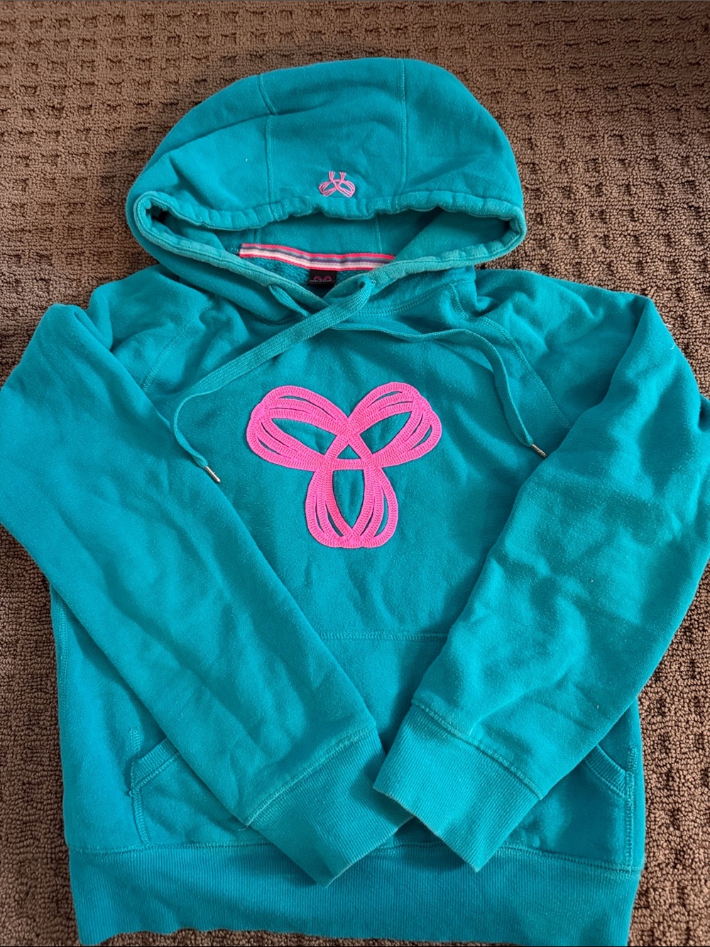 TNA Teal Hoodie with Pink Logo